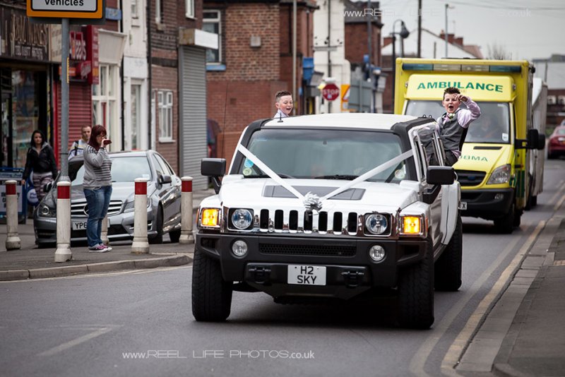 Gipsy wedding as the Hummer arrives